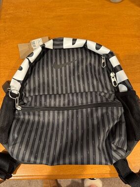 Nike Black and White Striped Mini Backpack